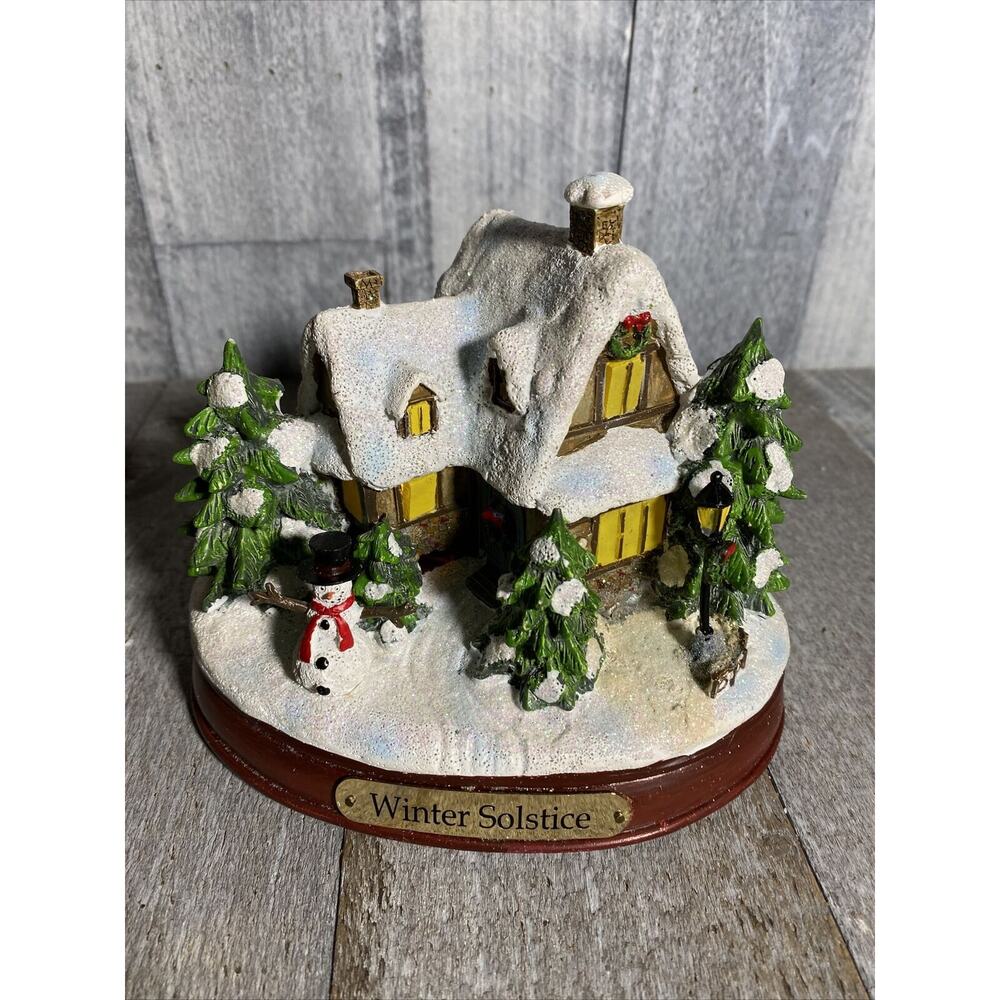 winter solstice lighted seasonal cottage Village